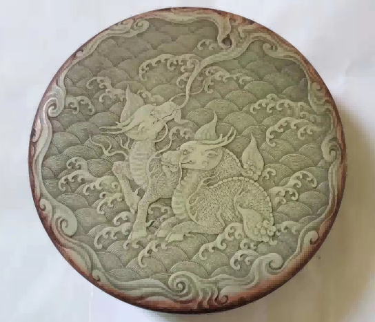 吴荣华的作品-麒麟吐露